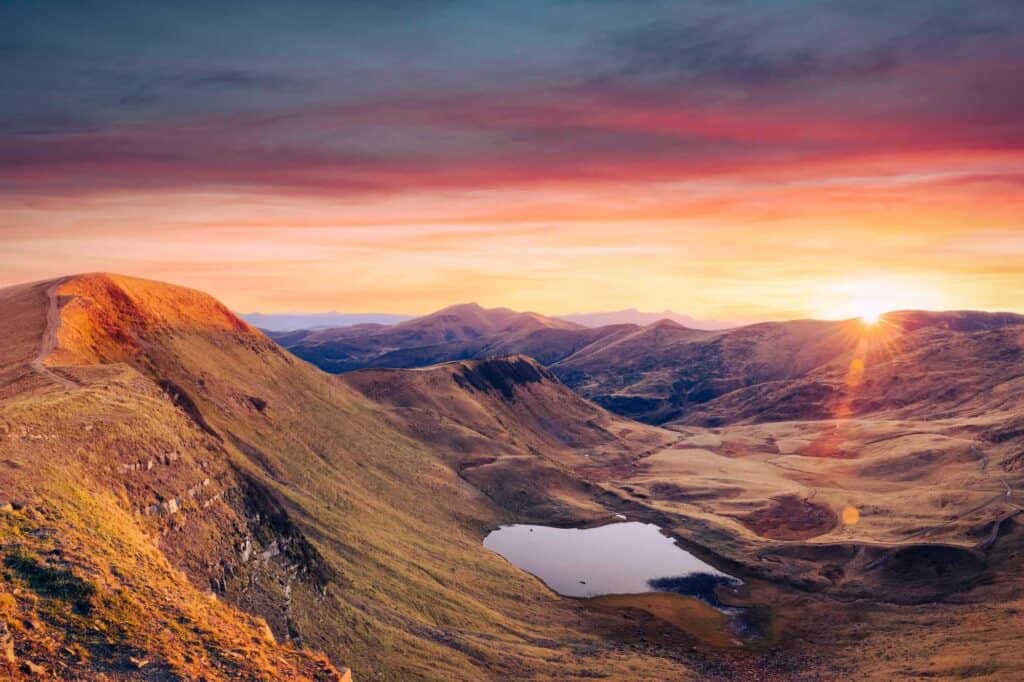 Mountain lake on sunrise time