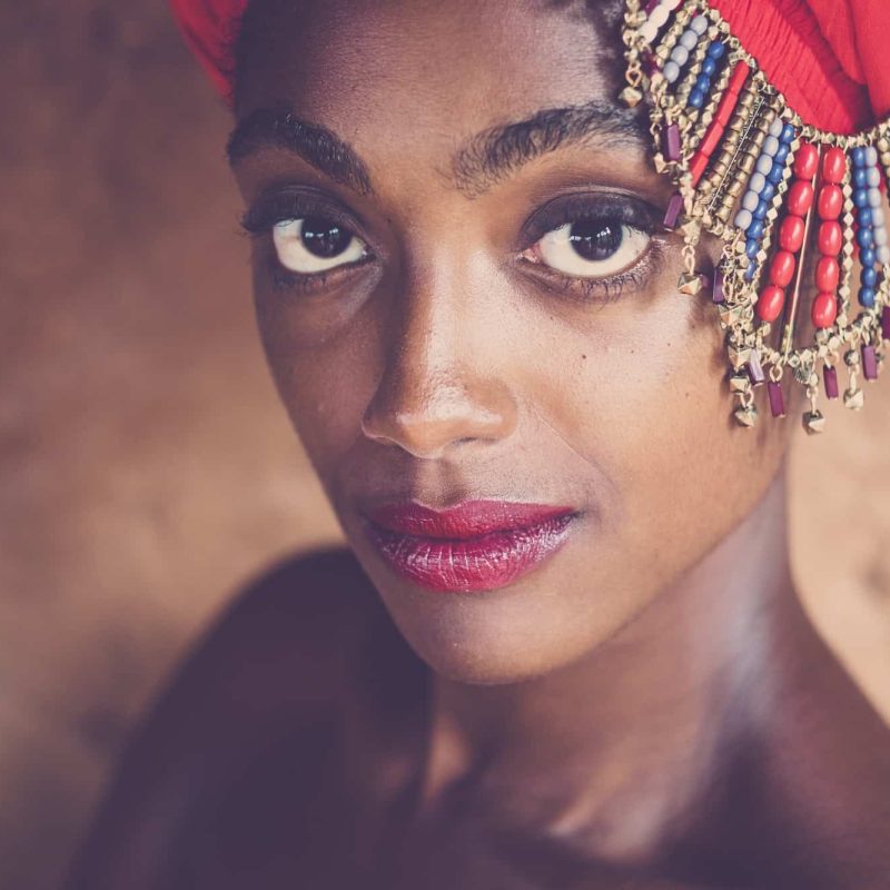 beauty-and-beautiful-black-african-girl-with-traditional-fashion-hat-with-jewels-posing-and-looking.jpg